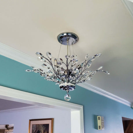 James R Moder Florale Collection Dual Mount Austria Pendant with crystal petals and branches hanging from ceiling.